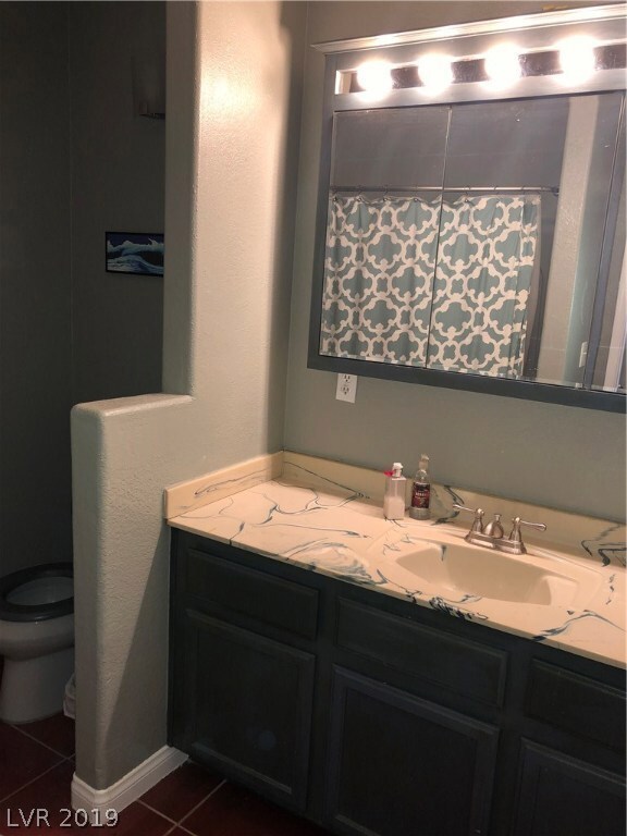 Full tub and shower with the master closet to the