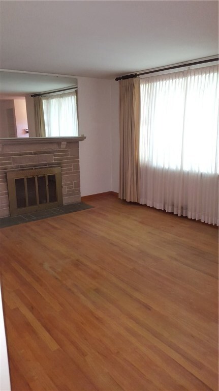 Nice size living room with wood burning fireplace