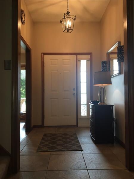 10 foot high ceilings greet you in the 11x06 entry