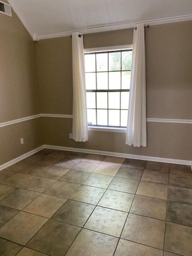 Versatile room with tile could be formal dining or that new home office you've been wanting!