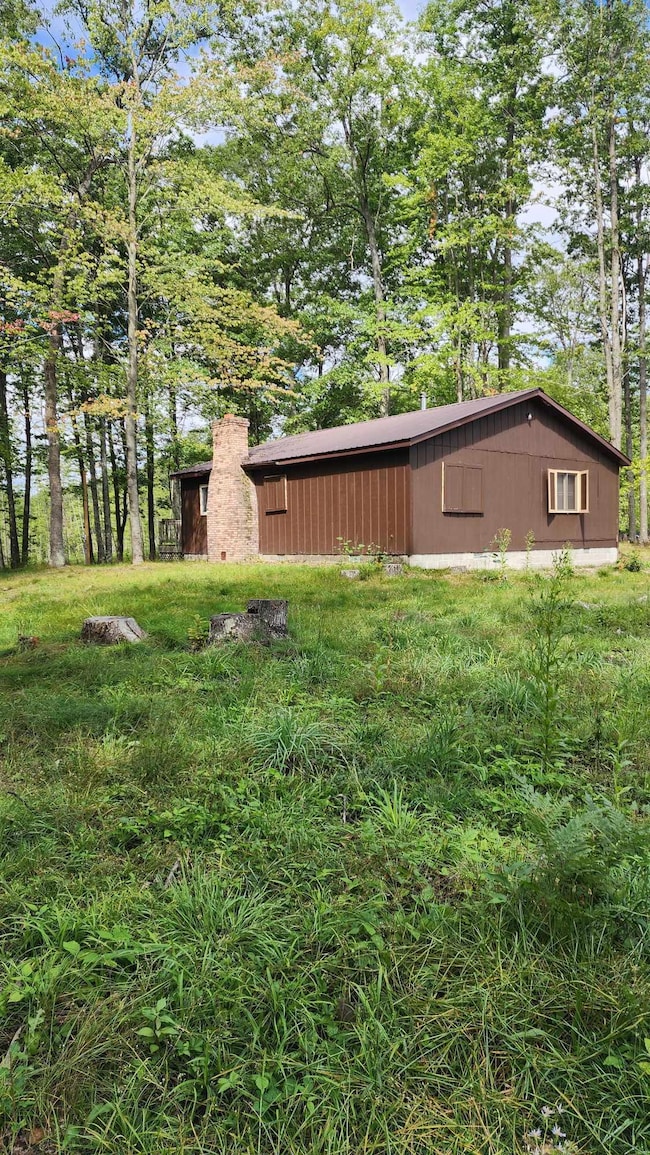 1385 N Hubbard Lake Rd, Spruce, MI 48762 - photo 5