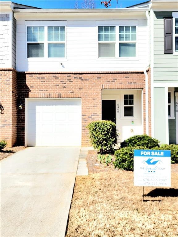 Multi unit property with an attached garage, drive