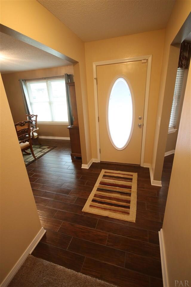 6 x 24 ceramic wood grain tile.