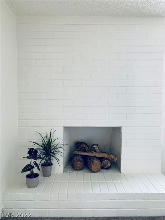 Floor to Ceiling Brick Fireplace