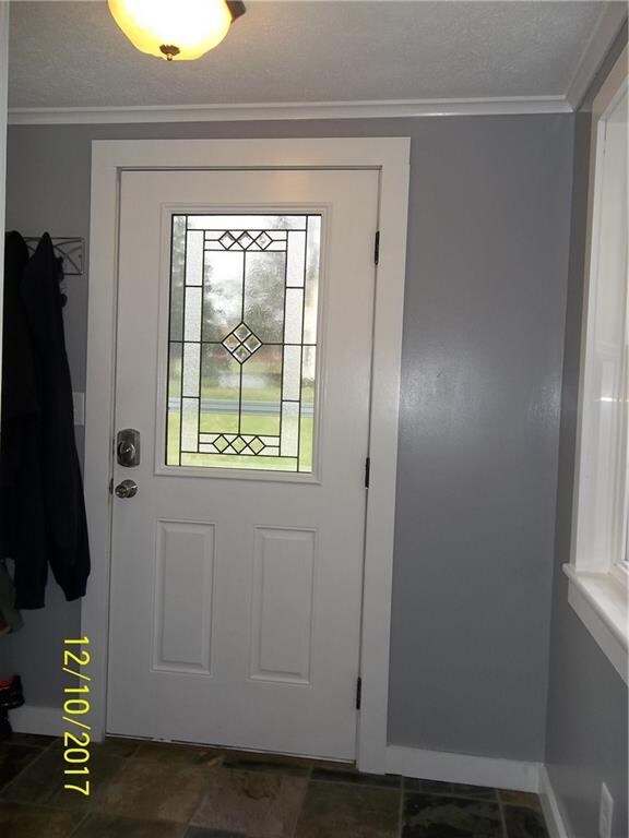 New front entry door into the foyer