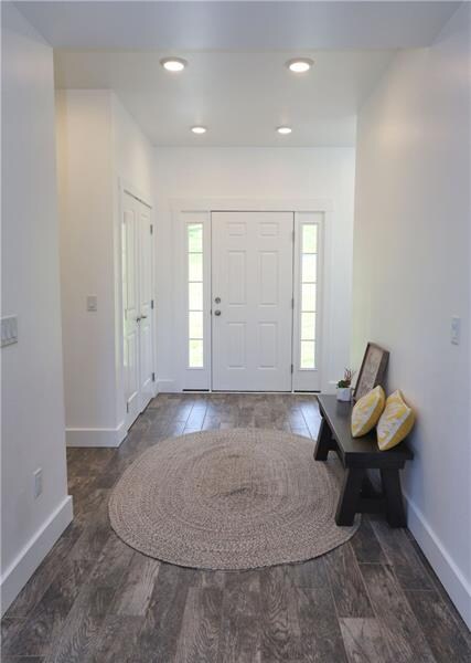 Bright & inviting entrance with trendy ceramic til
