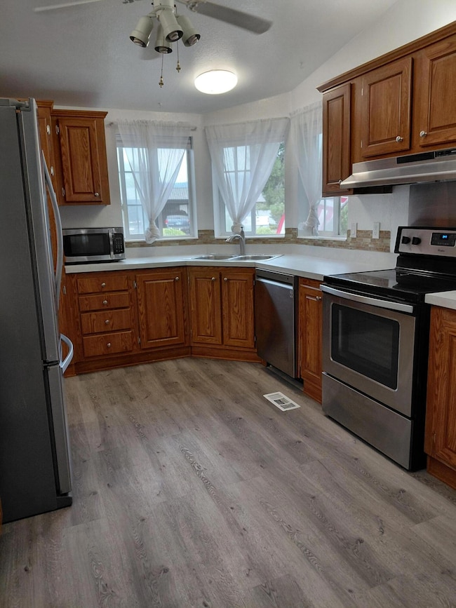 bright kitchen with corner windows