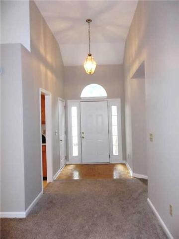 BEAUTIFUL PARQUET ENTRY WITH VAULTED CEILING