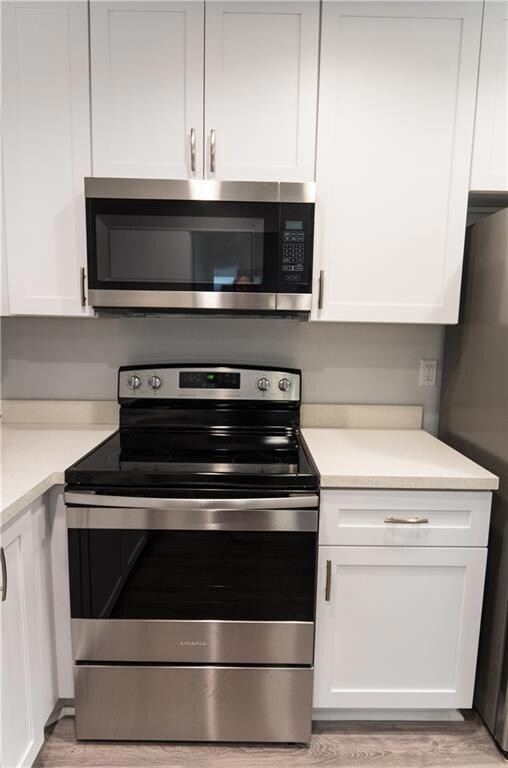 Built in microwave and brand new range oven.