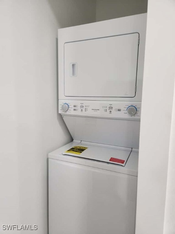 Laundry area with stacked washer / dryer