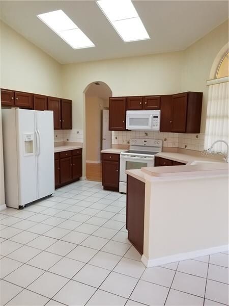 Kitchen adjoins family room