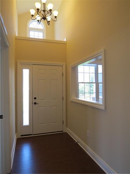 THE TWO STORY ENTRY WELCOMES YOU AND YOUR GUESTS I