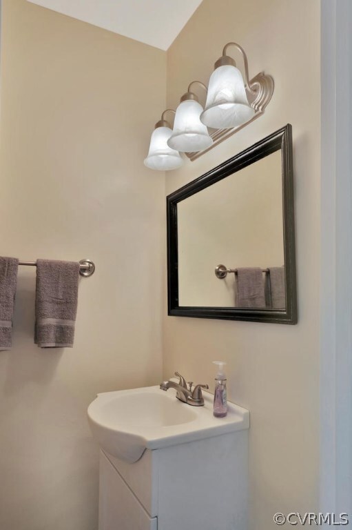 Half bath totally renovated with new floor, paint,