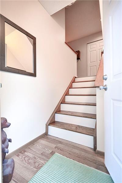 Front door entry.  Coat closet is visible at the t