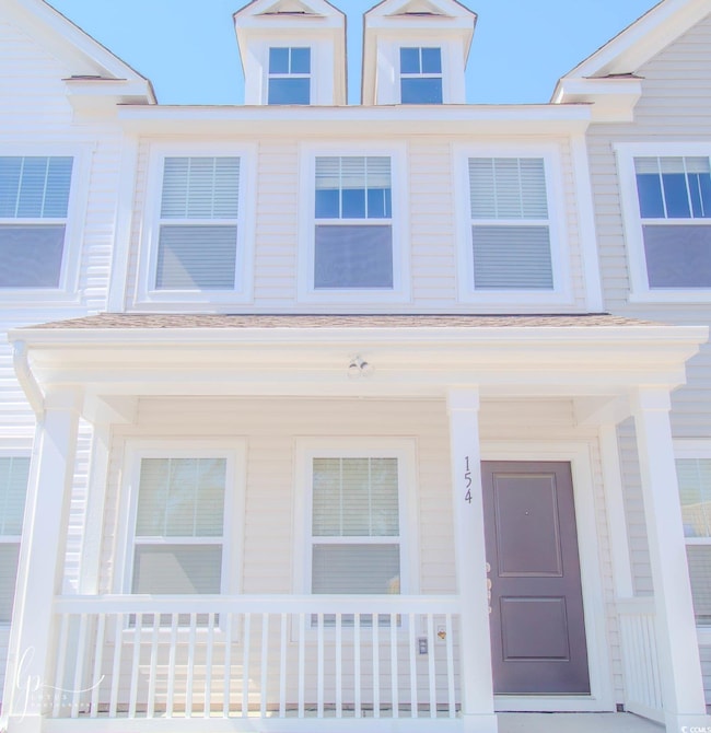 View of front of property featuring covered porch