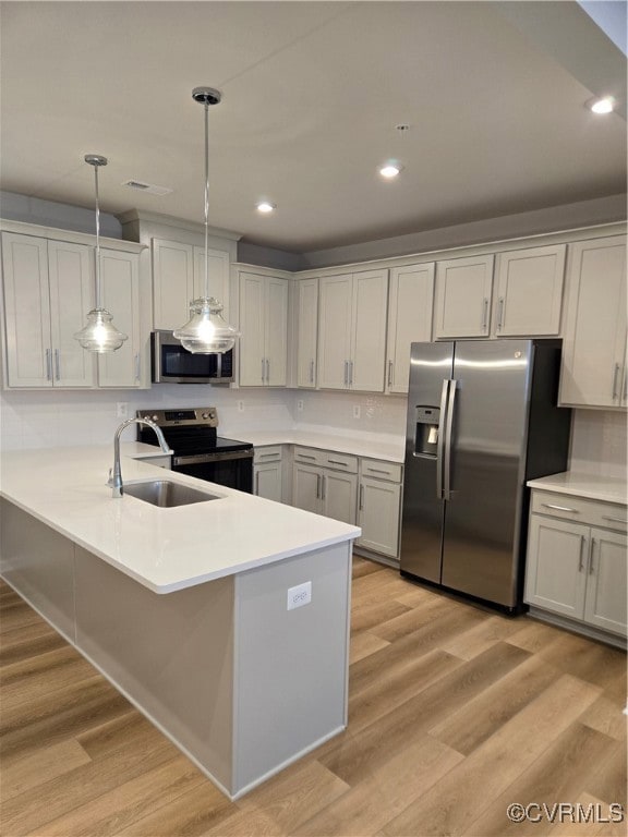 Kitchen featuring stove, refrigerator, decorative