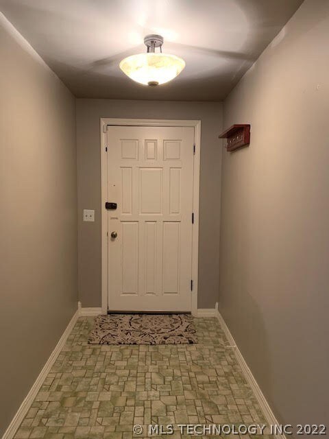 Entry Foyer to the home, steps down into the Great