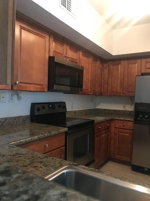 11770 Saint Andrews Place unit 202, Wellington, FL 33414 - photo 2