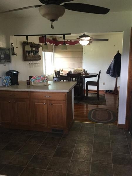 Breakfast counter with storage open to dining room