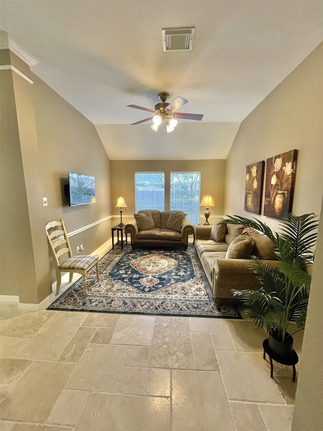 Furnished sitting room or tv room.