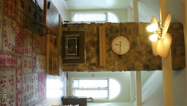 Free standing wood burning stone fireplace