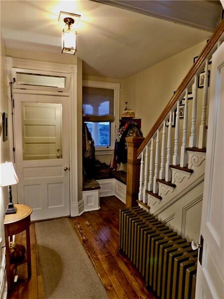 The foyer has 2 doorways to keep the cold outside.