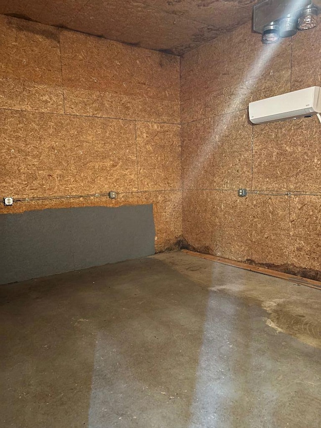 Inside outbuilding with heat pumps