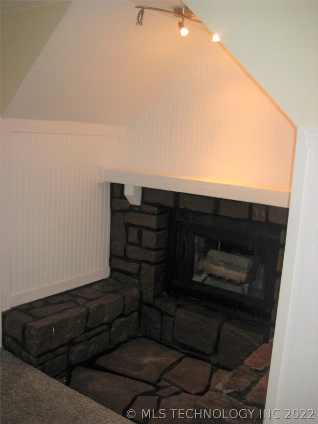Woodburning Fireplace...Seating om each side