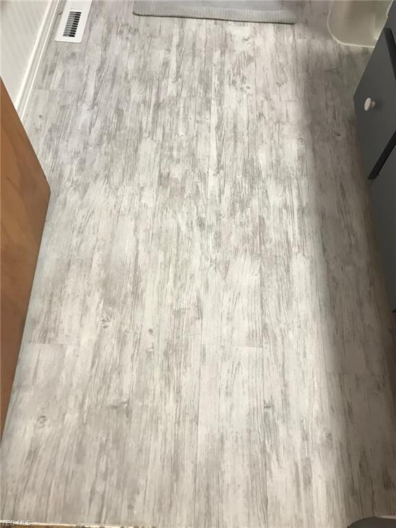 beautiful vinyl flooring in the laundry room