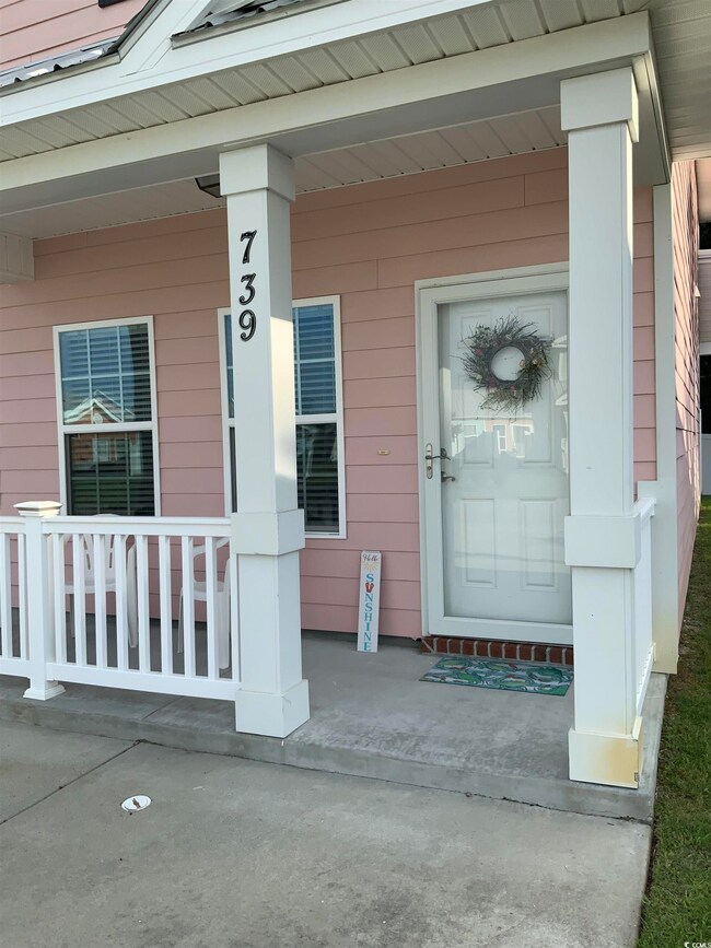 Entrance to property with a porch