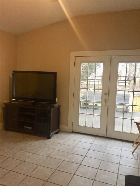 Rear family room with patio doors to the rear deck