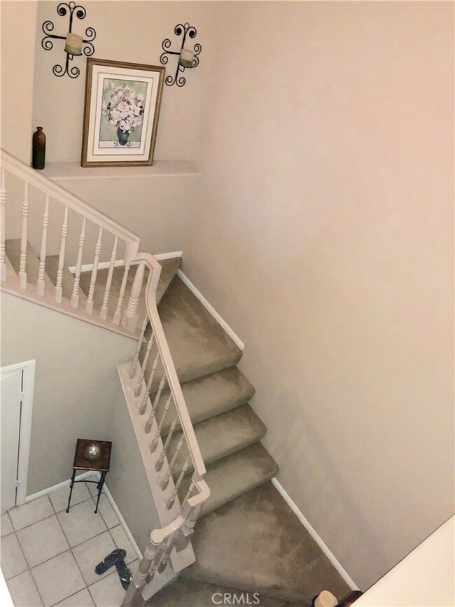 Carriage unit with direct 2-car garage access at foyer