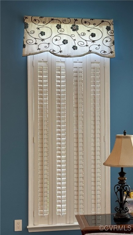 Plantation shutters in the sunken family room and