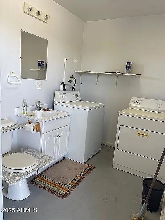another view of washer dryer toilet