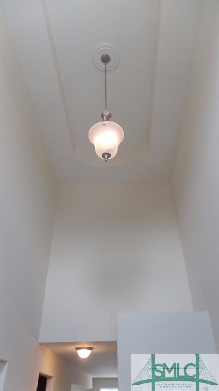 Grand 2-story entry way to include treyed ceiling,