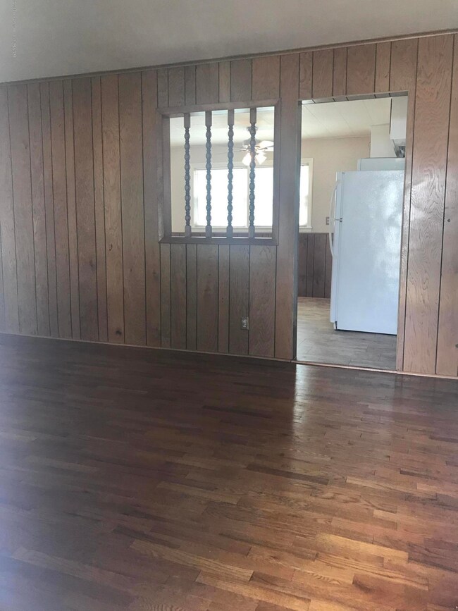 Living room looking into kitchen/dining