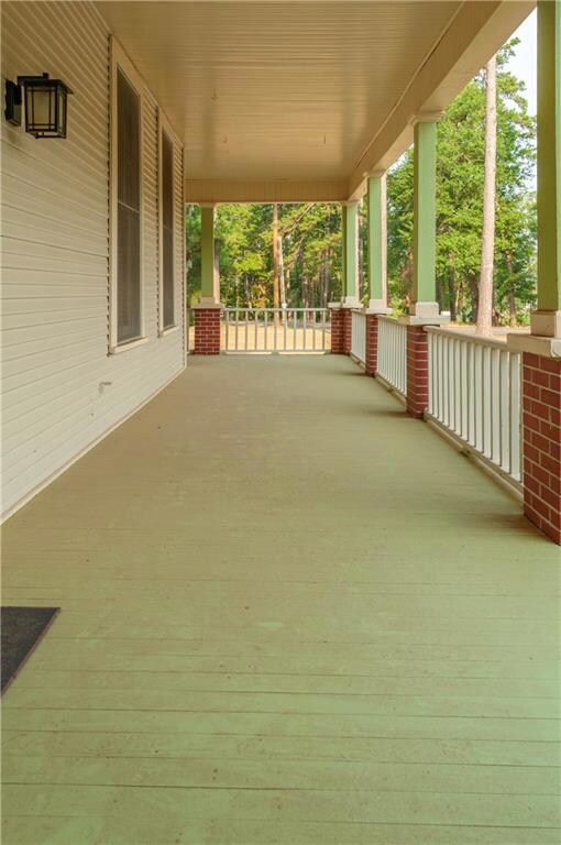 Just needs a few white rocking chairs!