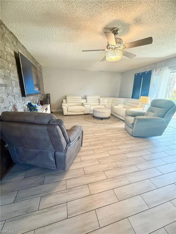 Living room with a textured ceiling, wood finish f