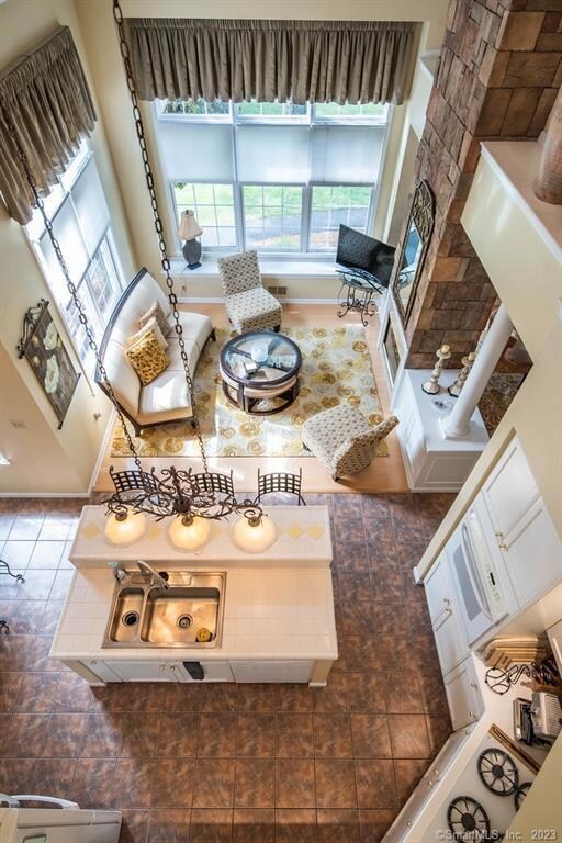 View from upper level into den