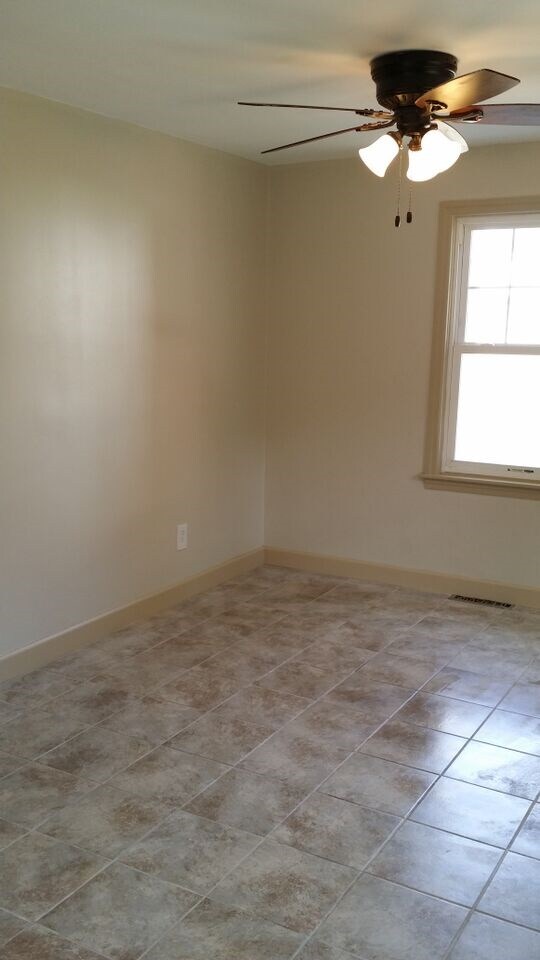 Spacious dining area large enough for a formal din