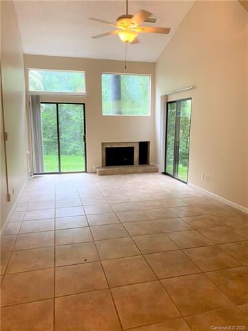 Great room with vaulted ceiling & gas fireplace