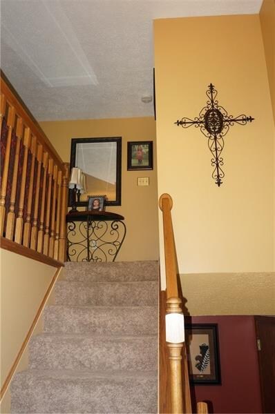Inviting split entry with newer light fixture