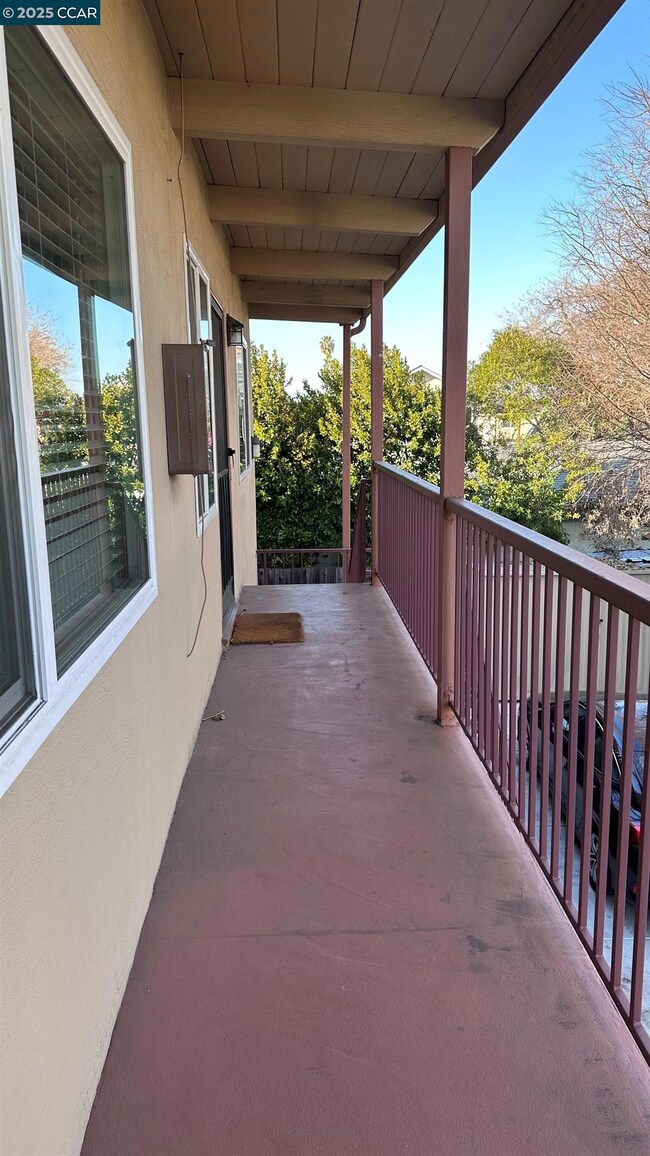 Outside corridor to the 2 units upstairs