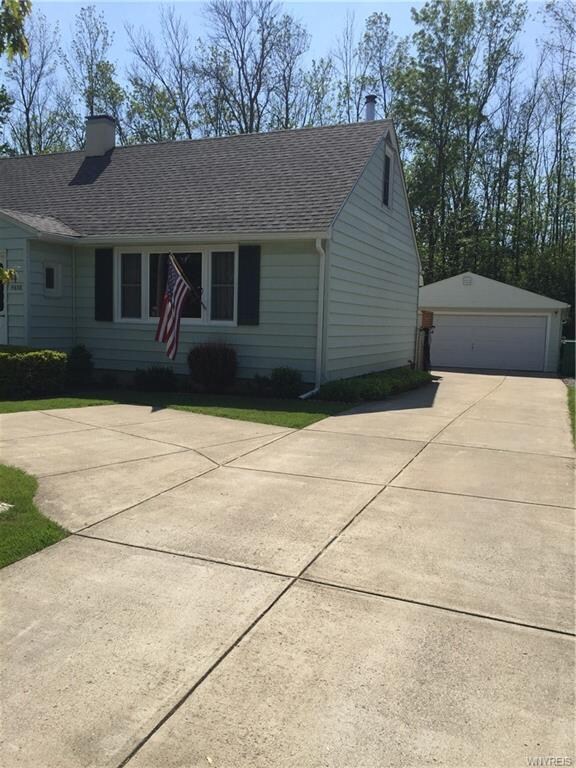 Exterior Side / concrete driveway