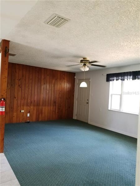 Living room with pine walls