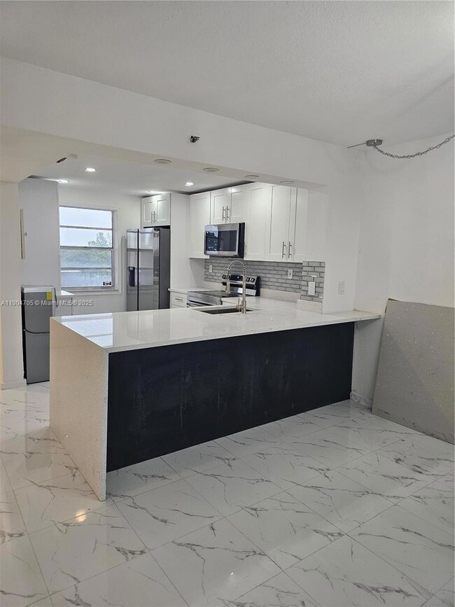 3910 Inverrary Blvd unit 703B, Lauderhill, FL 33319 - photo 7