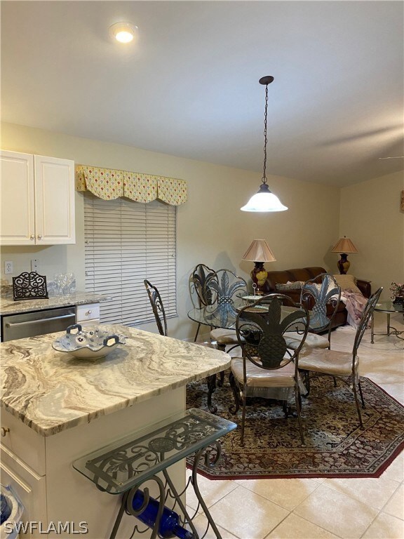 KITCHEN ISLAND AND BREAKFAST AREA