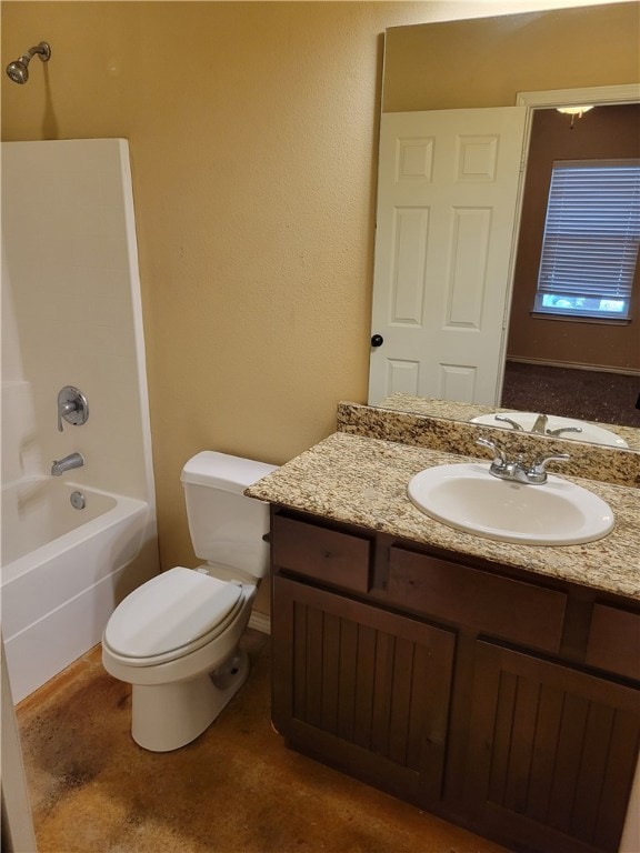 Bathroom with vanity, toilet, and tub / shower com