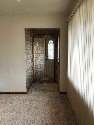 LIVING ROOM ENTRY CLOSET
