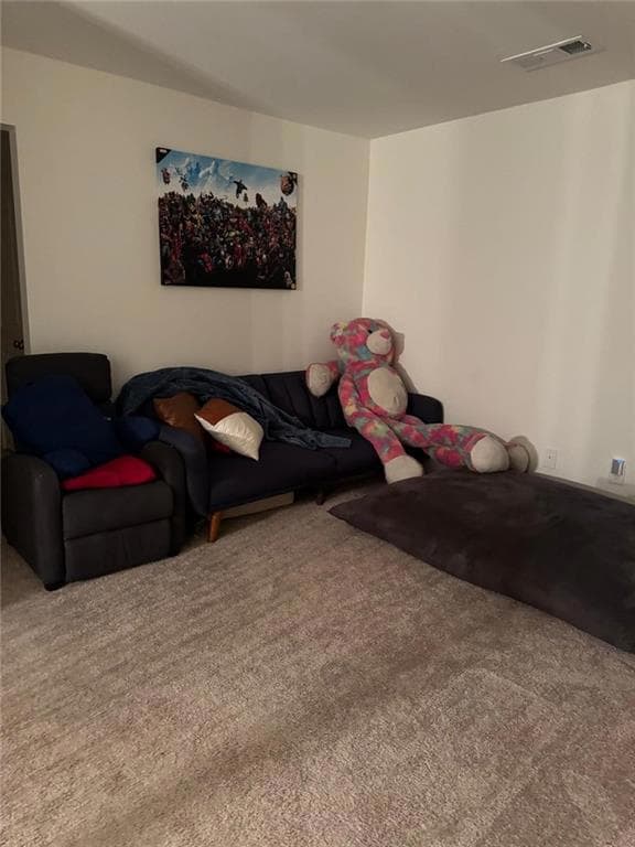 Living room featuring carpet flooring